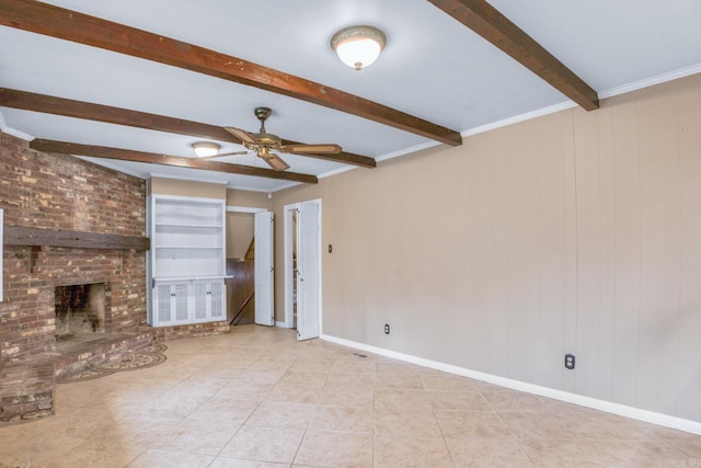 unfurnished living room with beam ceiling, a ceiling fan, a fireplace, tile patterned flooring, and baseboards