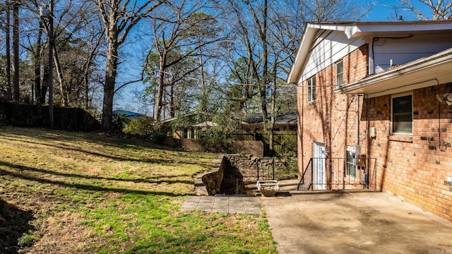 view of yard featuring a patio area and fence