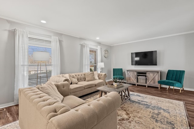 living room with visible vents, baseboards, ornamental molding, recessed lighting, and wood finished floors