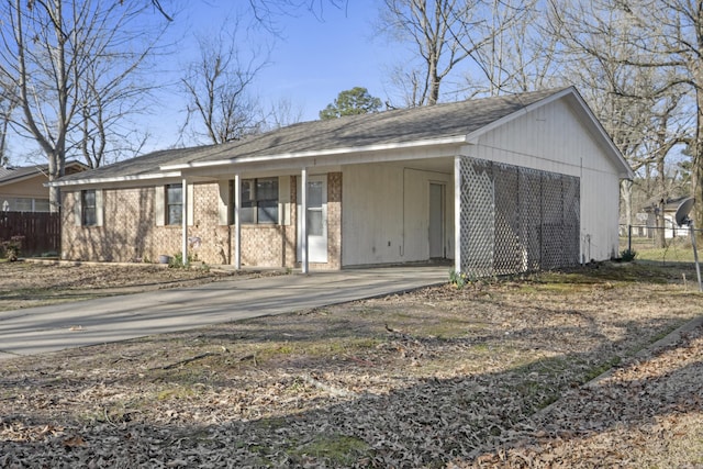 view of front of house featuring fence