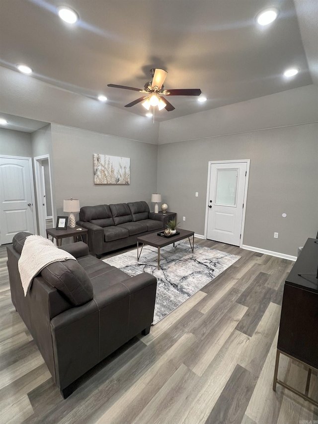 living room with recessed lighting, baseboards, wood finished floors, and a ceiling fan