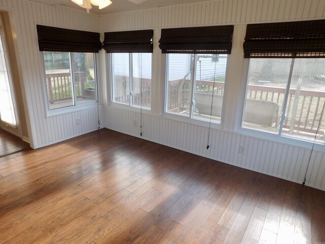 spare room with hardwood / wood-style flooring