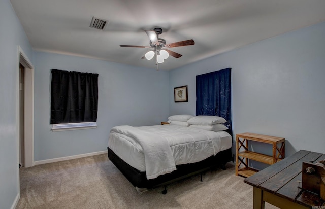 bedroom with visible vents, baseboards, a ceiling fan, and carpet flooring