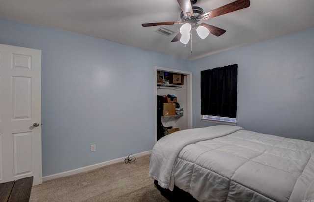 bedroom featuring visible vents, baseboards, carpet flooring, a closet, and a ceiling fan