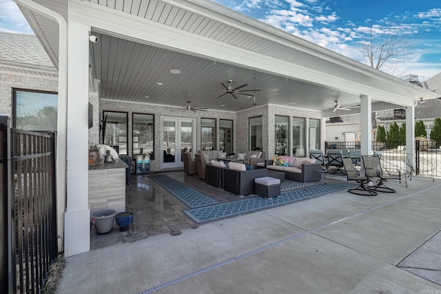 view of patio / terrace with a ceiling fan, fence, and an outdoor hangout area