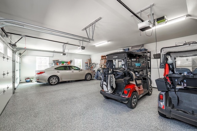 garage featuring a garage door opener