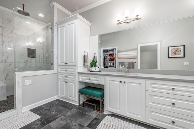 full bathroom with a marble finish shower and vanity