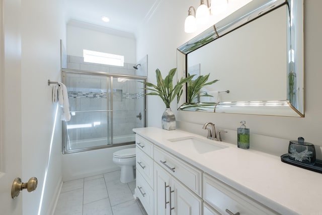 bathroom featuring bath / shower combo with glass door, toilet, vanity, and crown molding