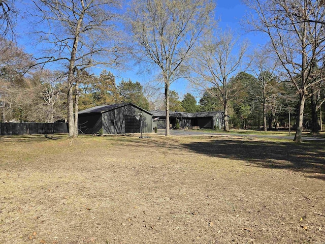 view of yard with fence