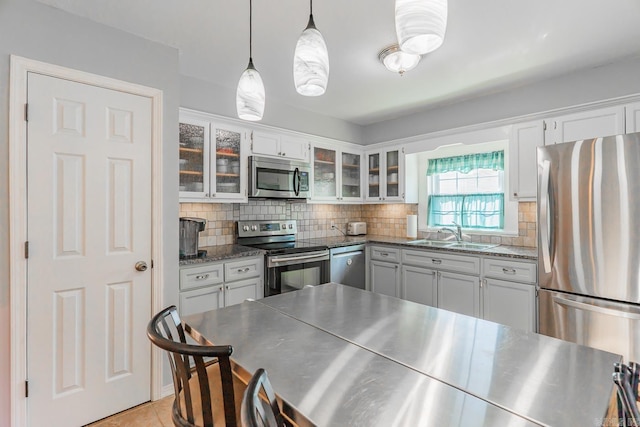 78 Altakima Cir, Cherokee Village, AR 72529 - kitchen with glass insert cabinets, stainless steel counters, decorative backsplash, appliances with stainless steel finishes, and a sink