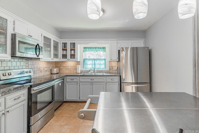 78 Altakima Cir, Cherokee Village, AR 72529 - kitchen featuring decorative backsplash, white cabinets, appliances with stainless steel finishes, and a sink