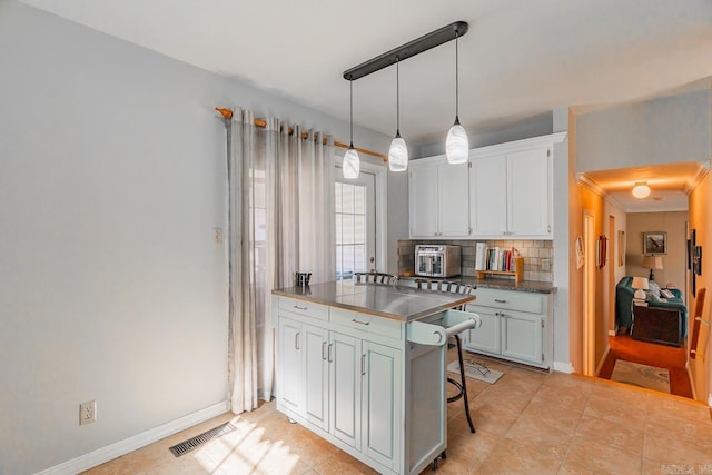 78 Altakima Cir, Cherokee Village, AR 72529 - kitchen featuring stainless steel countertops, baseboards, backsplash, and visible vents