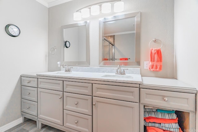 78 Altakima Cir, Cherokee Village, AR 72529 - bathroom with a shower with door, baseboards, double vanity, ornamental molding, and a sink