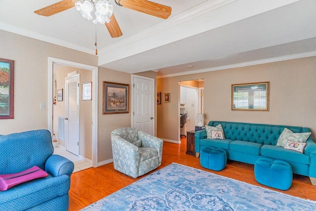 78 Altakima Cir, Cherokee Village, AR 72529 - living area featuring ceiling fan, wood finished floors, baseboards, and ornamental molding