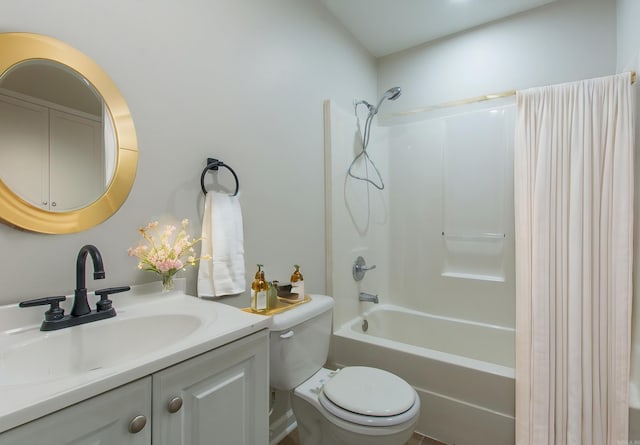 bathroom featuring shower / bath combination with curtain, toilet, and vanity