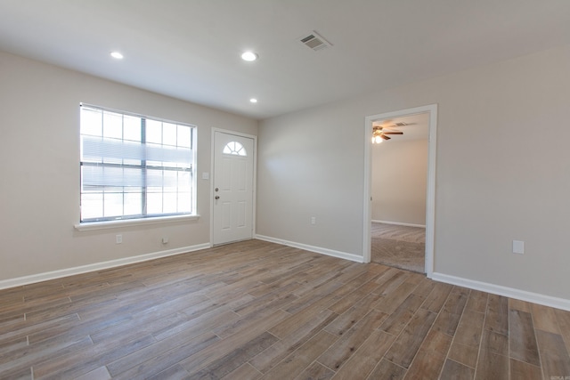 entryway featuring visible vents, a ceiling fan, wood finished floors, recessed lighting, and baseboards