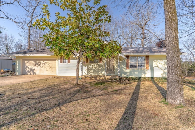 view of front of property featuring an attached garage and driveway