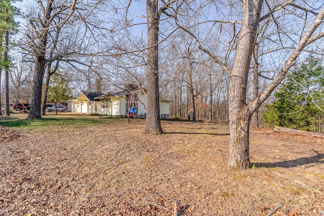 view of yard with an attached garage