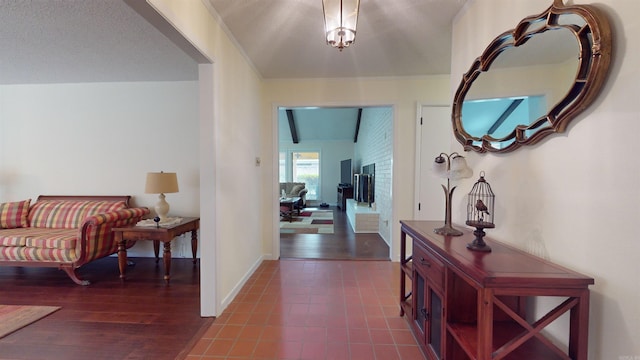 foyer entrance with dark wood-style floors and baseboards