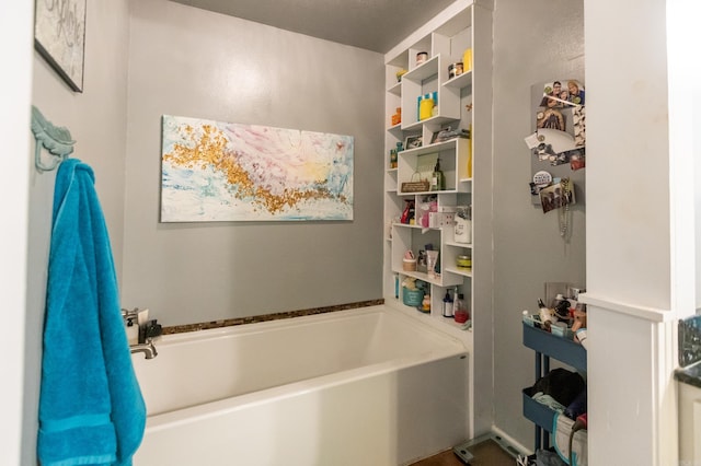 bathroom with a garden tub