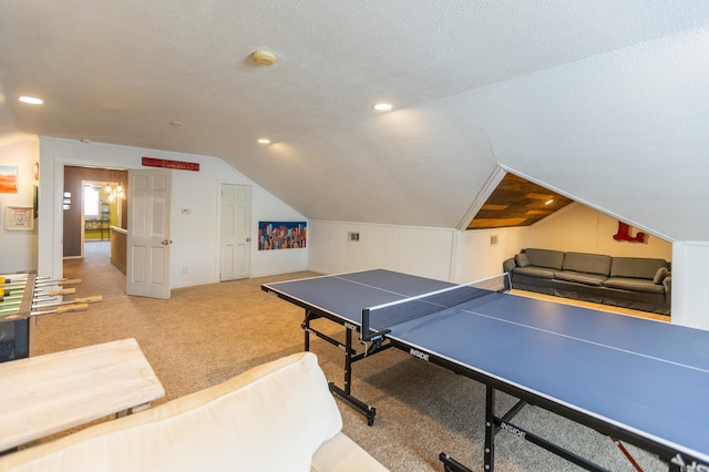 game room with lofted ceiling, carpet flooring, recessed lighting, and a textured ceiling