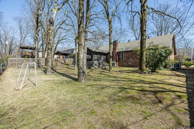 view of yard featuring fence