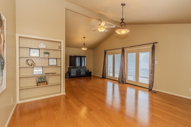 unfurnished living room with baseboards, a ceiling fan, and wood finished floors