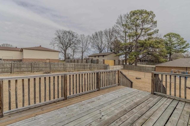 deck with a fenced backyard