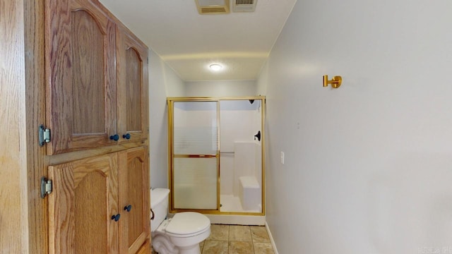 full bath featuring baseboards, visible vents, tile patterned flooring, a shower stall, and toilet