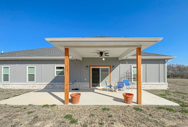 back of house with a patio, brick siding, a ceiling fan, and a shingled roof