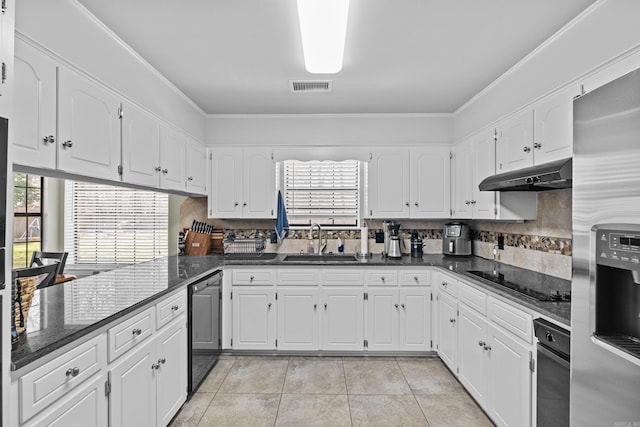 kitchen featuring visible vents, black appliances, under cabinet range hood, white cabinetry, and a sink