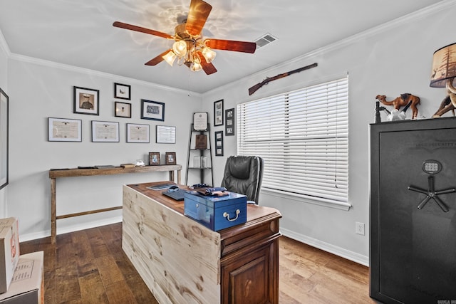 office space with ceiling fan, baseboards, hardwood / wood-style floors, and ornamental molding