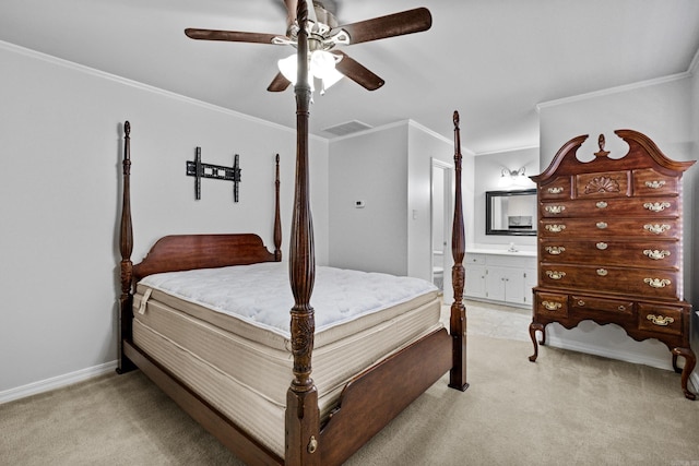 bedroom with a ceiling fan, visible vents, ensuite bathroom, light carpet, and crown molding