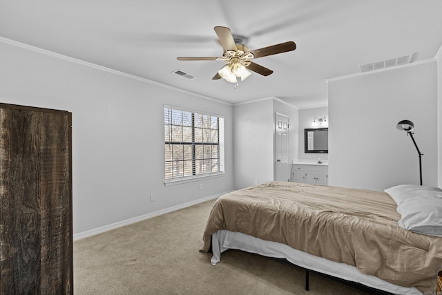 bedroom with visible vents, light colored carpet, baseboards, and ornamental molding