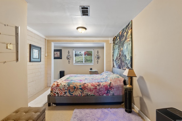 bedroom with visible vents and baseboards