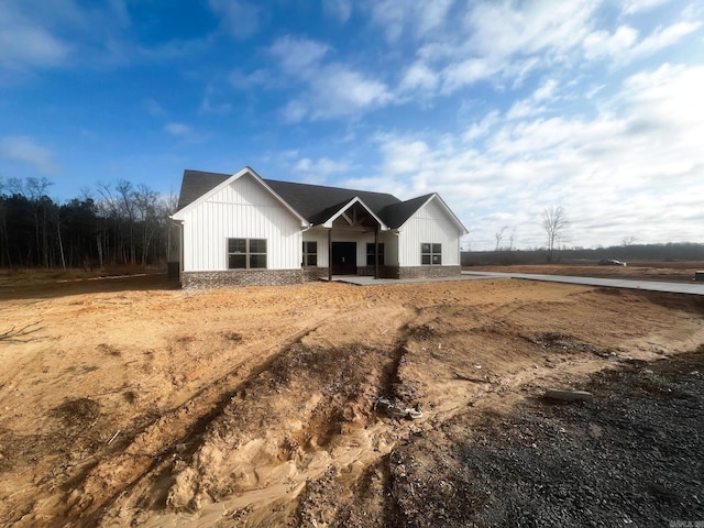 modern farmhouse with board and batten siding