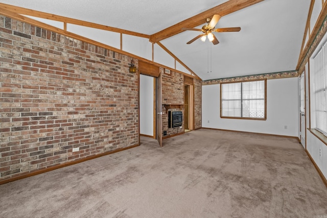 unfurnished living room with heating unit, carpet floors, brick wall, ceiling fan, and vaulted ceiling with beams
