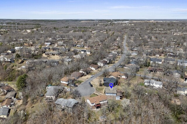 birds eye view of property with a residential view
