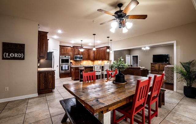 dining room featuring light tile patterned flooring, recessed lighting, baseboards, and ceiling fan