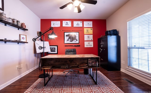 office with visible vents, baseboards, a ceiling fan, and wood finished floors