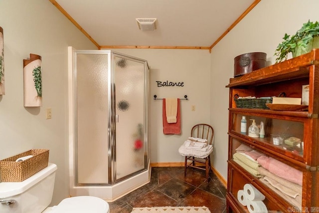 bathroom with visible vents, a stall shower, toilet, and crown molding