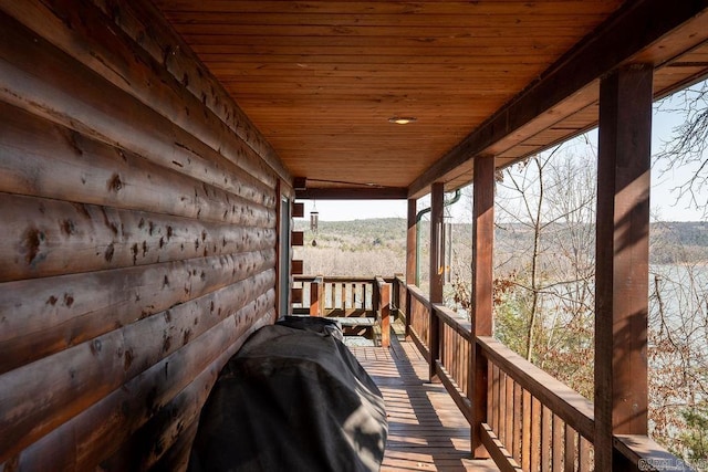 wooden terrace with grilling area