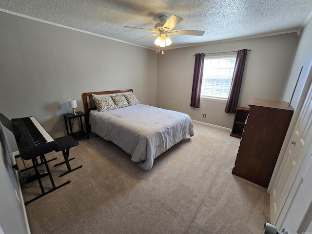 bedroom with light colored carpet, a textured ceiling, crown molding, and ceiling fan