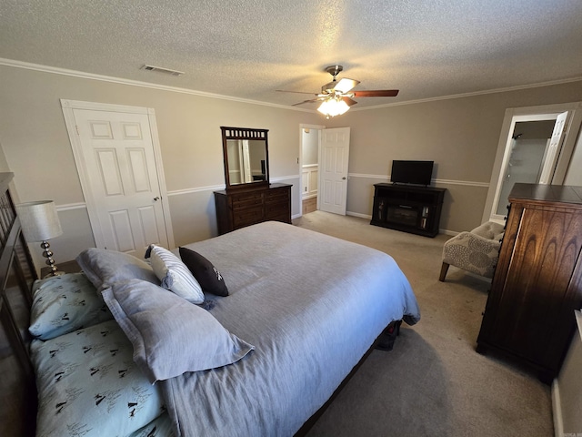 bedroom featuring ornamental molding, a ceiling fan, visible vents, and light carpet