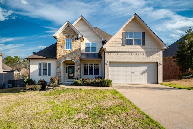 view of front of property with a front lawn, stone siding, metal roof, concrete driveway, and a garage