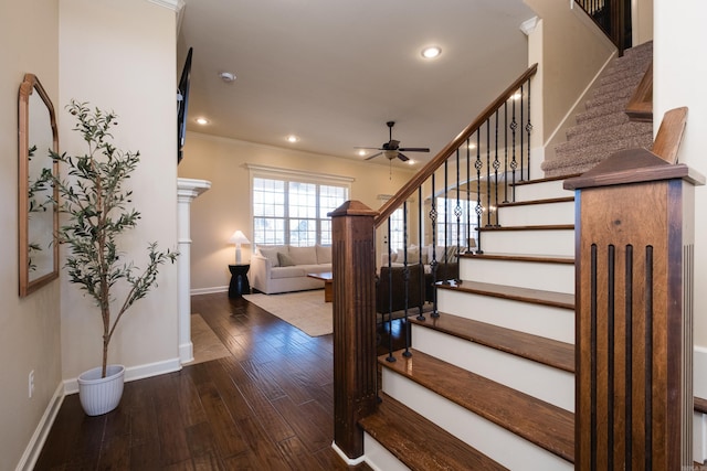 staircase featuring ornamental molding, wood finished floors, recessed lighting, baseboards, and ceiling fan