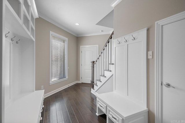 mudroom with dark wood finished floors, recessed lighting, baseboards, and ornamental molding