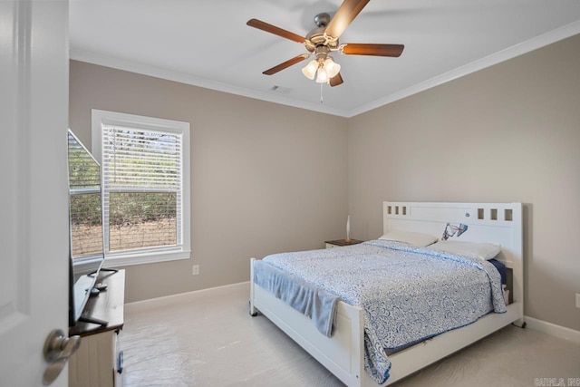 bedroom with visible vents, crown molding, baseboards, ceiling fan, and light colored carpet