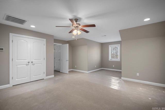 unfurnished bedroom featuring visible vents, a ceiling fan, recessed lighting, baseboards, and light colored carpet