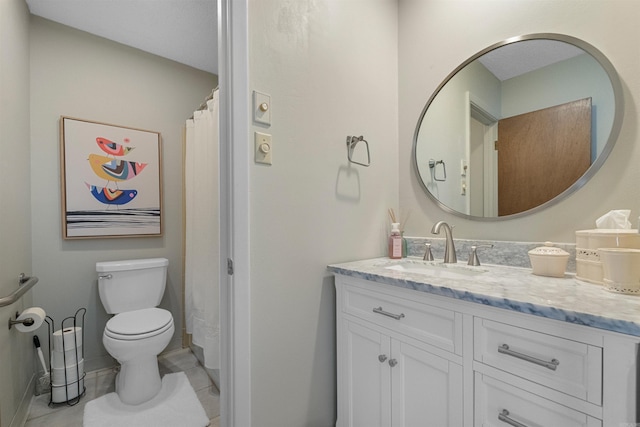 full bathroom featuring tile patterned floors, baseboards, toilet, and vanity